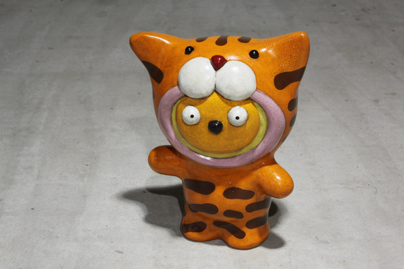 Taehee wanna be a China Orange Tiger, 41x23x46cm, milk paint on plastic, 2010.JPG